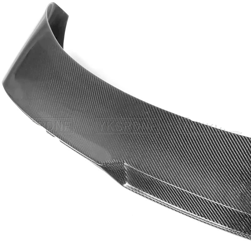 Carbon fiber car spoiler on a white background