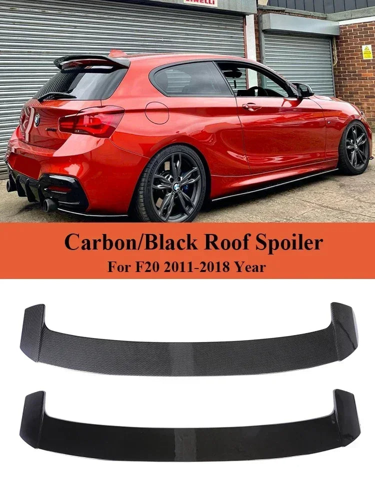Spoiler for BMW f20-f21, this photo shows the car with the spoiler mounted, it also shows the compatibility it has and the two different type of spoilers. carbon e glossy black- M-Pure Dynamics