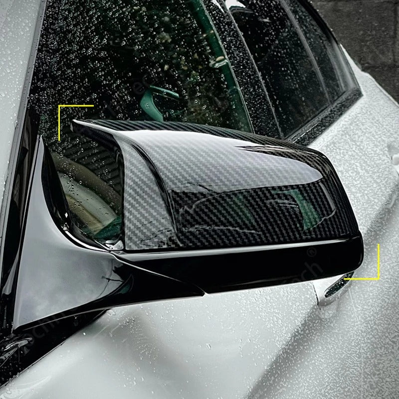 The Photo shows the Sport Cap installed on the car, with the carbon fiber color