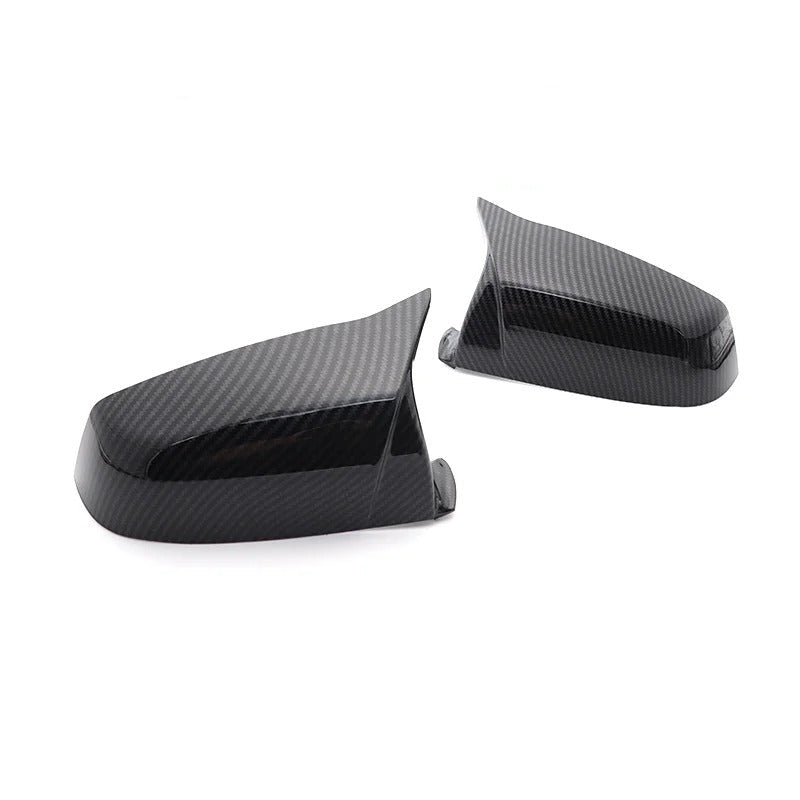 The Photo shows the Sport Cap installed on the car, with the carbon fiber color