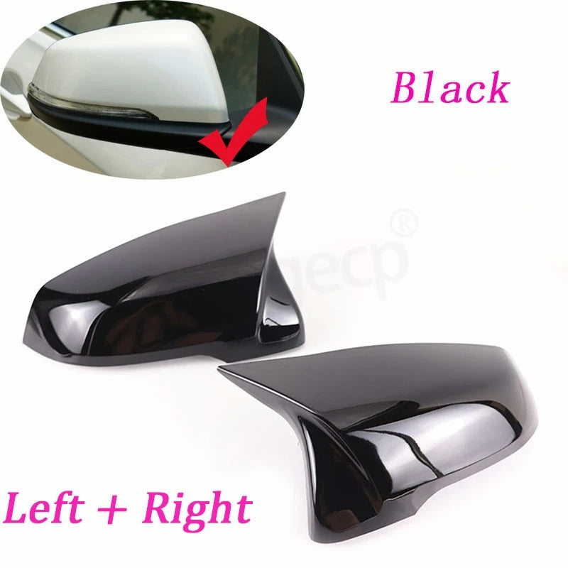 This photo shows up close the mirror caps mounted on the car, displaying the black variation