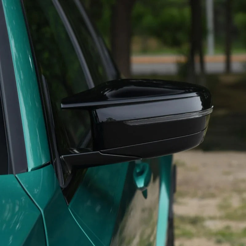 This photo shows the sport cap for the g20 in the black gloss look, mounted on the car