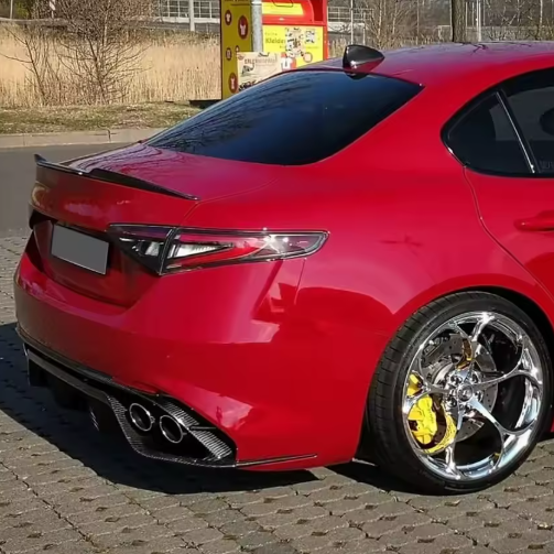Spoiler for Alfa Romeo Giulia Berlina 2015-2023, here the photo shows the carbon fiber spoiler up close mounted on the car - M-Pure Dynamics