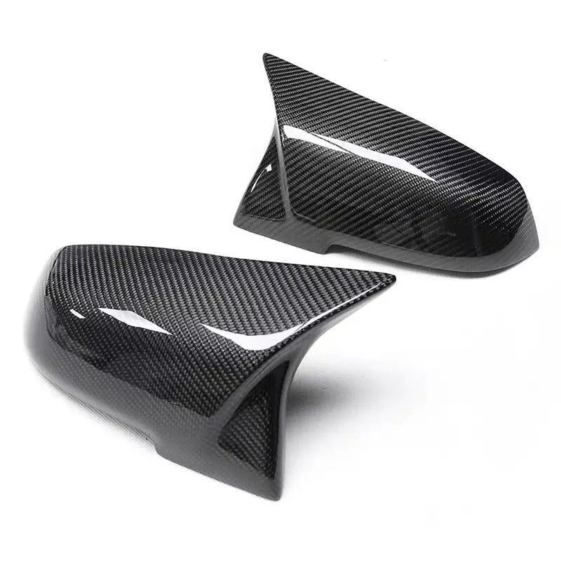 BMW M3 F80 M4 F82 F83 Carbon Fiber Mirror Cover Caps, the photo shows the carbon fiber look mirror caps - M-Pure Dynamics