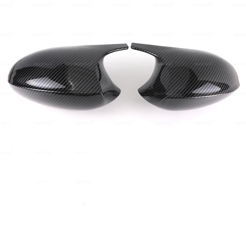 M Style Mirror Cover Caps for BMW Series 1 3 E87 E81 E82 E90 E91 E92 E93 , the photo shows two variants the glossy black one and the carbon fiber look - M-Pure Dynamics