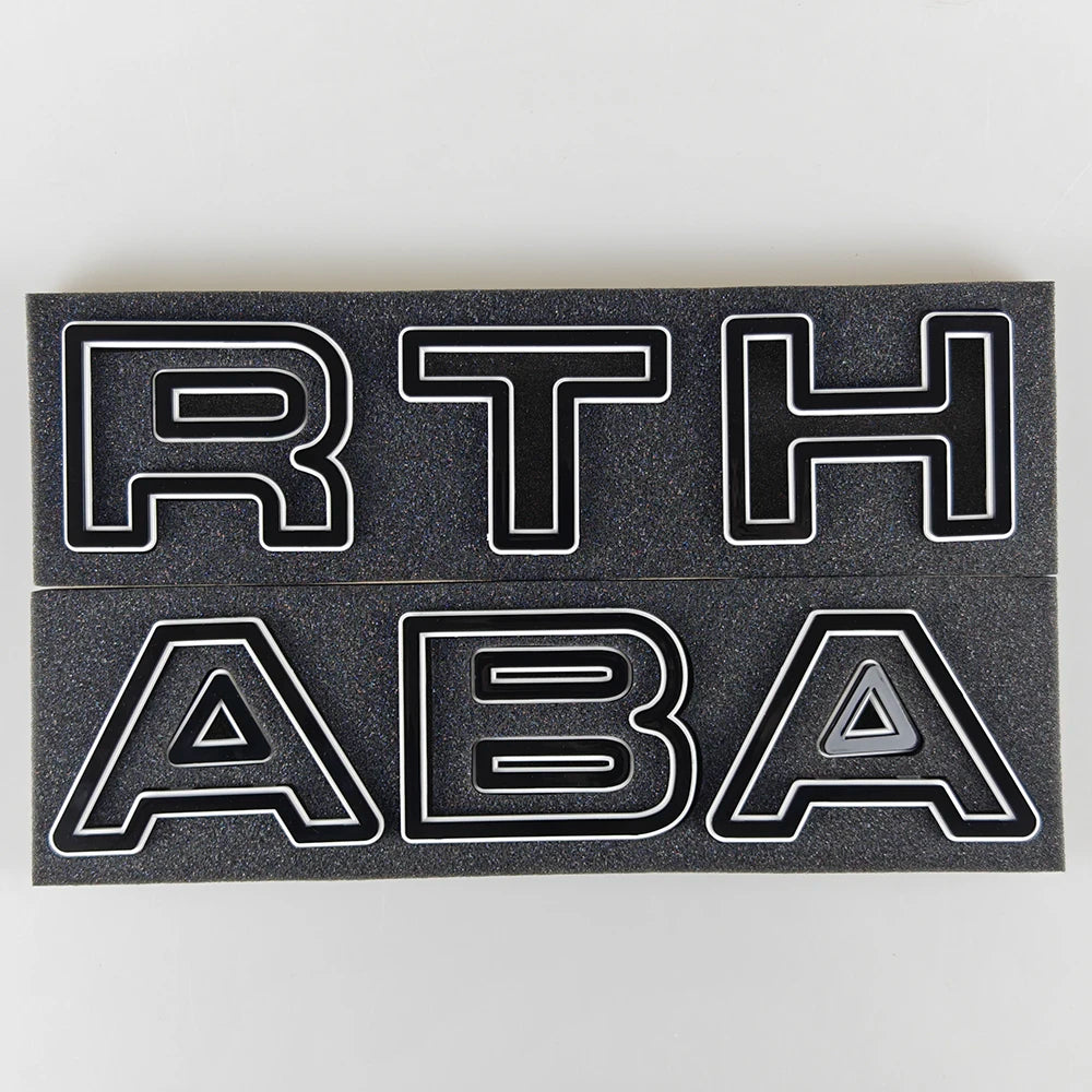 Abarth Letters for front Grillle for Abarth 500 and595, here the photo shows the product with the black style - M-Pure Dynamics