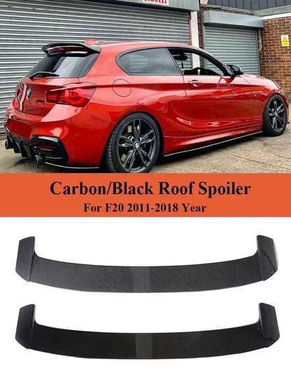 Spoiler for BMW f20-f21, this photo shows the car with the spoiler mounted, it also shows the compatibility it has and the two different type of spoilers. carbon e glossy black- M-Pure Dynamics