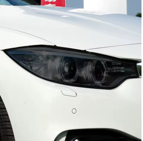 Protective Headlight Film for Bmw F32-F33-F36, here the photo shows the black headlight protective film up close, showcasing the color of the healight - M-Pure Dynamics