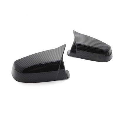 The Photo shows the Sport Cap installed on the car, with the carbon fiber color