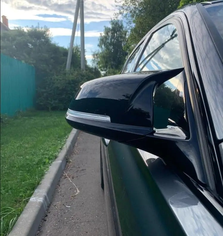This photo shows up close the mirror caps mounted on the car