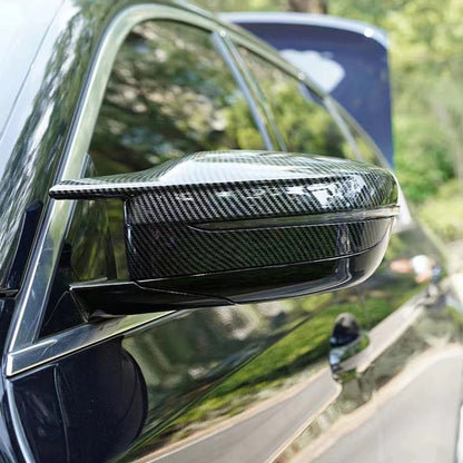 This photo shows the sport cap for the g20 in the carbon fiber look mounted on the car