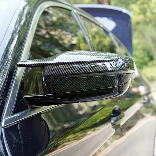 This photo shows the sport cap for the g20 in the carbon fiber look mounted on the car
