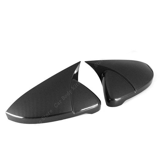 Carbon fiber car mirror covers on a white background