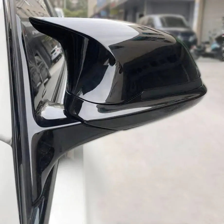 BMW M3 F80 M4 F82 F83 Carbon Fiber Mirror Cover Caps, the photo shows the glossy black look mirror caps - M-Pure Dynamics