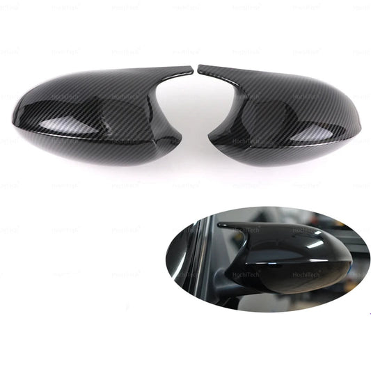 M Style Mirror Cover Caps for BMW Series 1 3 E87 E81 E82 E90 E91 E92 E93 , the photo shows two variants the glossy black one and the carbon fiber look - M-Pure Dynamics