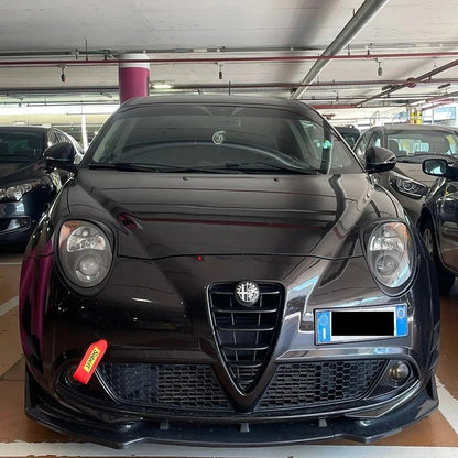 Black Alfa Romeo car in a parking garage