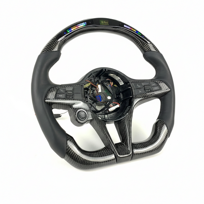 Carbon fiber steering wheel with visible branding on a white background