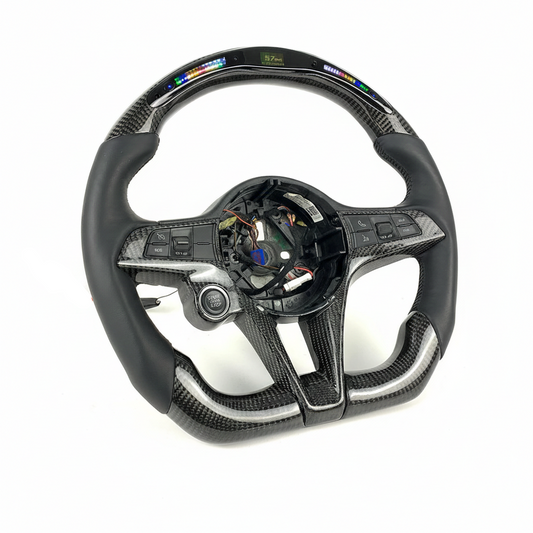 Carbon fiber steering wheel with visible branding on a white background
